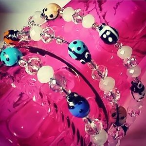 Glass Beaded ladybugs most colors stretch bracelet
